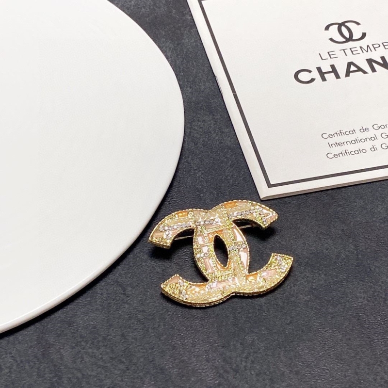 Ch**el brooches